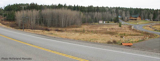 View of site from highway heading south